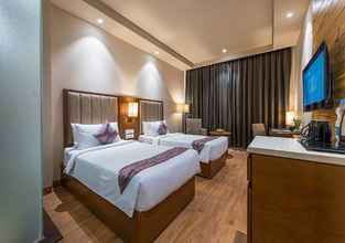 Kamar Tidur 4 Hotel Cachar Club by Siara