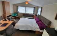 Bedroom 7 3 Bedroom Caravan, Sleeps 8, at Parkdean Newquay Holiday Park