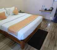 Bedroom 7 Goroomgo Silicon Residency Puri