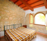 Bedroom 7 Tuscan Farmhouse in Montescudaio With Private Pool