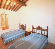 Bedroom 6 Tuscan Farmhouse in Montescudaio With Private Pool