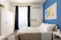 Phòng ngủ Appartamento Blu al porto