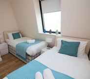 Bedroom 2 Stayzo Castle Point Apartments Premier Lodge