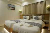 Kamar Tidur Hotel Elysian Residency