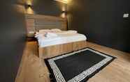 Bedroom 7 OTTO City Premium Suites