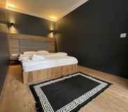 Kamar Tidur 7 OTTO City Premium Suites
