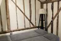 Bedroom The Cow Shed 2-bed Apartment in Bradwell on Sea