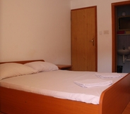 Bedroom 4 Apartmans and rooms Mato