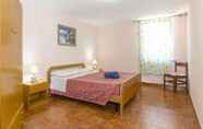 Kamar Tidur 6 Posada Bright Apartments