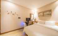 Kamar Tidur 3 Guri Boutique Hotel XYM