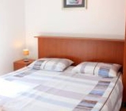 Bedroom 6 Apartment For 22 Pax In Cavtat