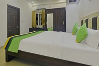 Bedroom Treebo Trend Hotel Sampradaya