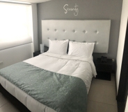 Kamar Tidur 7 Hotel Serenity Corferias Bogota