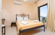 Bedroom 3 Villa Eufrosini Large Private Pool Walk to Beach Sea Views A C Wifi Car Not Required - 2301