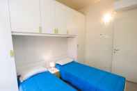 Phòng ngủ Appartamenti l'Orologio - Le Lancette