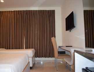 Bedroom 2 Hotel orchard Inn