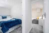 Bedroom Bedford Hospital Maisonette - 2BR by Homely Spaces