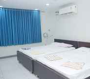 Phòng ngủ 3 Kubera Service Apartments