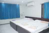 Phòng ngủ Kubera Service Apartments