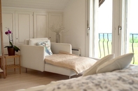 Bedroom Stunning 6-bed Villa in Etoy