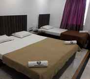 Kamar Tidur 4 Hotel Ramco Residency