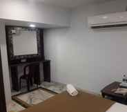 Kamar Tidur 5 Hotel Ramco Residency