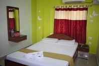 Kamar Tidur Golden Sun Inn