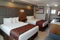 Phòng ngủ Coastal Sands Inn