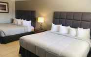 Kamar Tidur 4 Coastal Sands Inn