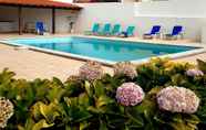 Kolam Renang 6 Impecable 4-bed Villa in Praia da Areia Branca