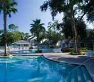 สระว่ายน้ำ 5 Tropical Enchanted Oaks Villa