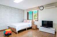 ห้องนอน Geoje Rojas Condo Pension