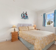 Bedroom 4 Surf Deck - Lovely Apartment Spectacular Coastal Views Short Walk to Beach