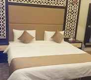 Kamar Tidur 2 Arabian Palm Hotel