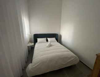Kamar Tidur 2 Deluxe Apartment with Private GardenArea