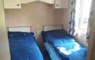 Bedroom 5 3-bedroom Caravan at Thorness bay