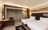 ห้องนอน 2 Hotel Cosmopolitan Ahmedabad
