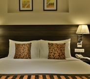 Kamar Tidur 5 The Fern Residency Vadodara