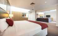 Bedroom 3 Ramada Hotel & Suites Sydney Cabramatta