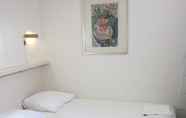 Kamar Tidur 7 Hotel Titus