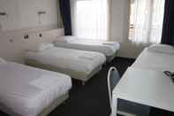 ห้องนอน Hotel Titus