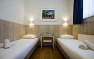 Kamar Tidur 5 Hotel Titus