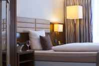 Kamar Tidur Hotel Simon's Plaza