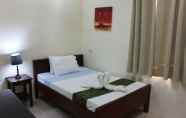 Kamar Tidur 2 Blue Lagoon Inn & Suites