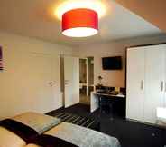 Bedroom 5 Hotel Leo Station et Annexes
