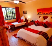 Bilik Tidur 5 African Footprints Lodge