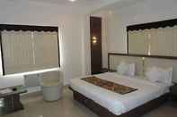 ห้องนอน Hotel Maniram Palace