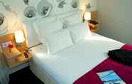 Bedroom 4 Appart'City Classic Reims Parc des Expositions
