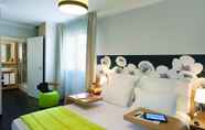 Bedroom 2 Appart'City Classic Reims Parc des Expositions