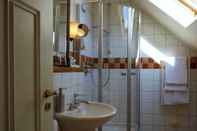 ห้องน้ำภายในห้อง Hotel Snorrenburg